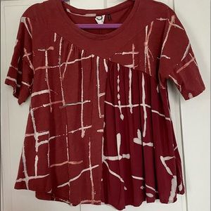 2 different materials make this top so unique.